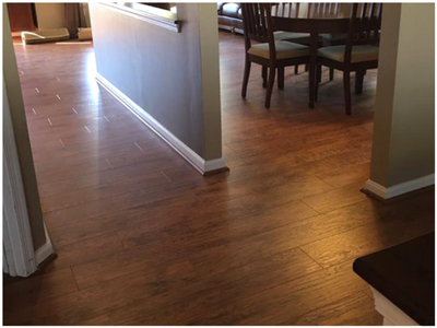 hardwood in hallway living room and dining area