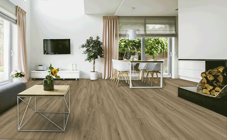 luxury vinyl plank flooring in living room with light pink drapes